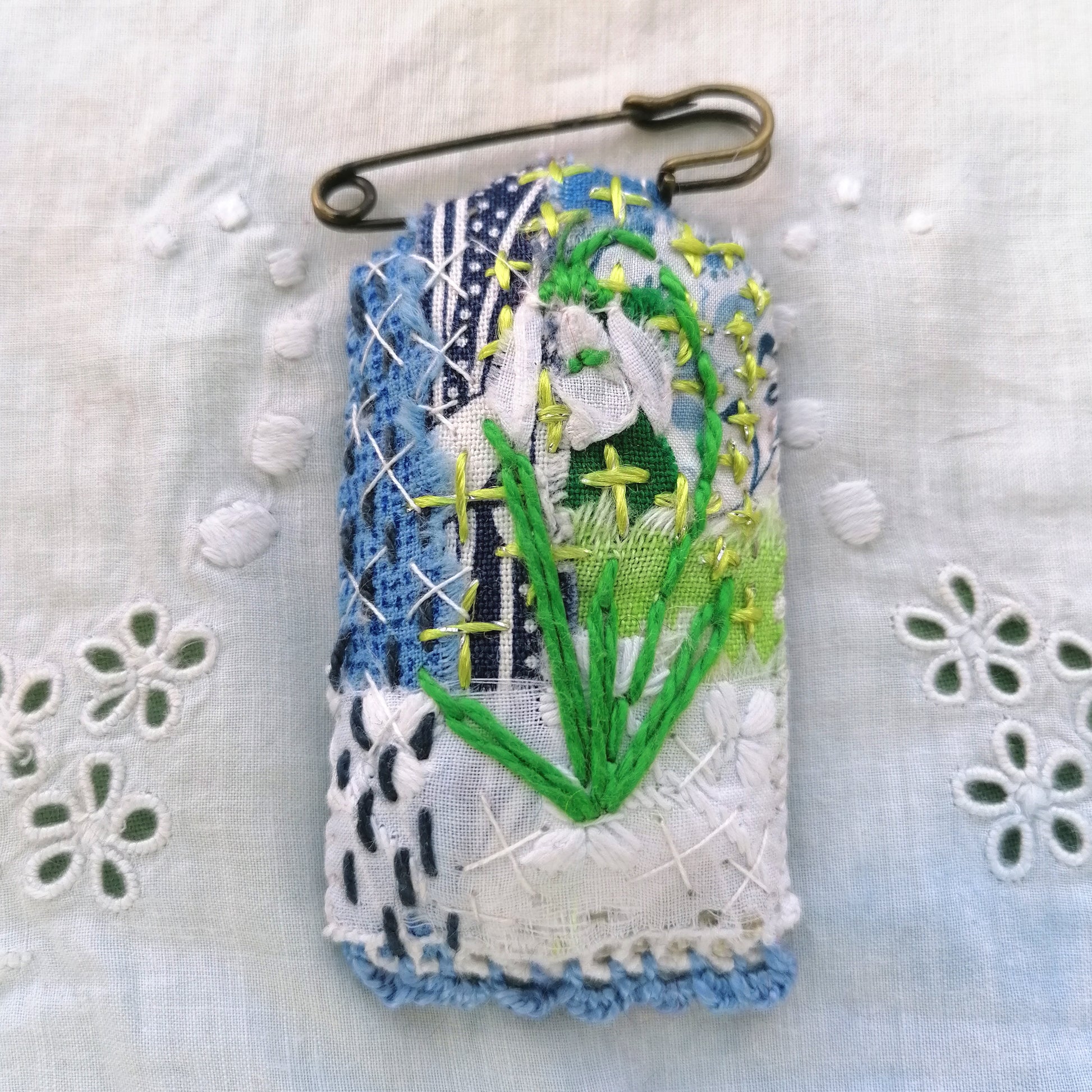 Tag shaped, padded and embroidered snowdrop brooch 2 on vintage style bronze tone kilt pin